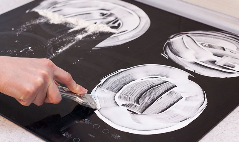 copped picture of a person sprucing a stove